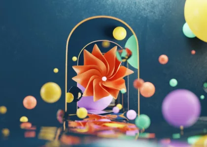 a birdcage with a bow on it surrounded by balloons